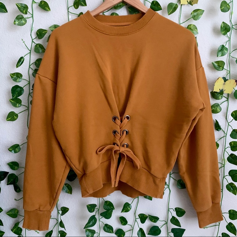 Women’s yellow corset style sweater